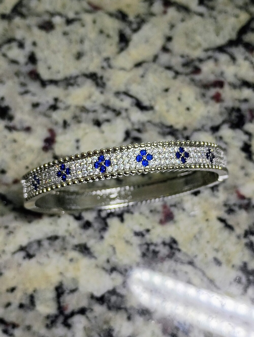 New Silver Tone Bangle Bracelet with Blue Gem Flower Accents